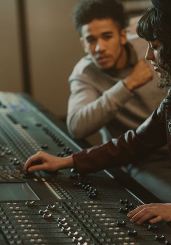 sound producers working with graphic equalizer at recording stud sound producers working with graphic equalizer at recording studio